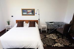 Un pat sau paturi într-o cameră la Apartment Larin