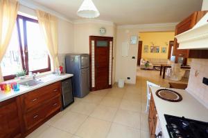 Kuchyň nebo kuchyňský kout v ubytování Apartment Larin