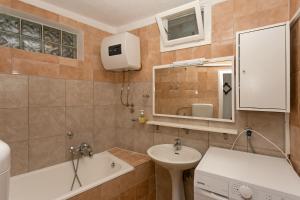Ένα μπάνιο στο Apartments Bicanic +54 φωτογραφίες