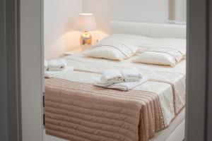 Postel nebo postele na pokoji v ubytování Modern Apartman Pjero