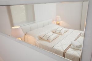 Postel nebo postele na pokoji v ubytování Modern Apartman Pjero