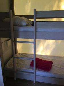 Postel nebo postele na pokoji v ubytování Camping les Orangers