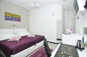 Postel nebo postele na pokoji v ubytování Apartmani Trogir