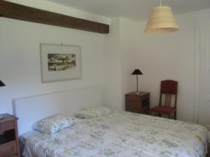 Un pat sau paturi într-o cameră la Jägerhaus