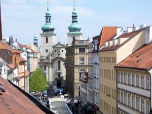 a view of a city with buildings and domes at Michalská 2 - Old Town Apartment in Prague