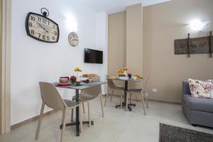TV a/nebo společenská místnost v ubytování B&B Cinisi Mare e Monti