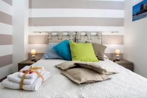 Postel nebo postele na pokoji v ubytování B&B Cinisi Mare e Monti