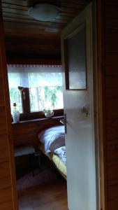 Letto o letti in una camera di Chata u sovicky Malino Brdo