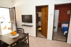 TV a/nebo společenská místnost v ubytování Apartment Sena