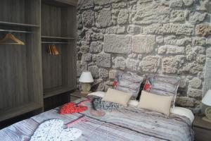 Postel nebo postele na pokoji v ubytování La Bastide de l'Olivier