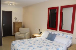 A bed or beds in a room at Dream Cuesta