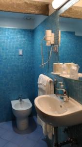 Vannituba majutusasutuses Hotel Santa Croce