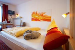 Postel nebo postele na pokoji v ubytování Landhaus Nagelfluh