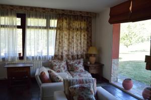 Zona de estar de Hotel El Jisu