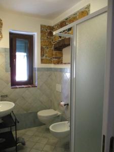 Ένα μπάνιο στο Casa Porto Azzurro
