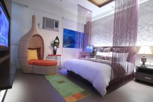 เตียงในห้องที่ Cha Guo Zi
