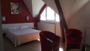 Postel nebo postele na pokoji v ubytování Le Relais de la Pointe du Van