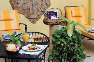 TV a/nebo společenská místnost v ubytování Hotel Residencial
