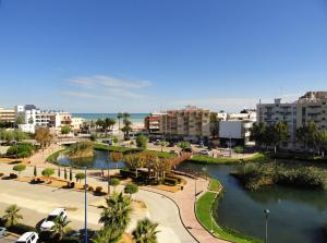 a view of a city with buildings and a river at Sky Home Peñiscola in Peniscola