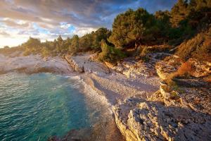 an aerial view of a rocky beach with the ocean at Holiday Home Istra with JACUZZI in Medulin
