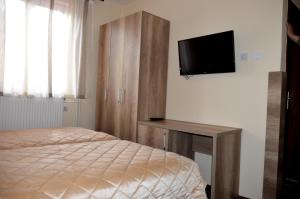 TV/Unterhaltungsangebot in der Unterkunft Hotel Čile