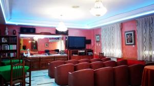 TV a/nebo společenská místnost v ubytování Hostal Manolete