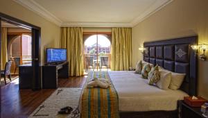 Postel nebo postele na pokoji v ubytování Palm Plaza Marrakech