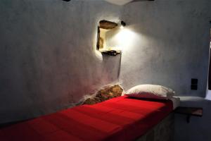 Postel nebo postele na pokoji v ubytování Lithos Homes