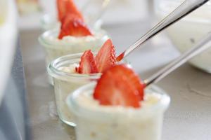a group of three desserts with strawberries in them at Hotel Engelhorn in Leimen +57 photos