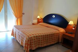 Posteľ alebo postele v izbe v ubytovaní Sait Hotel & BB