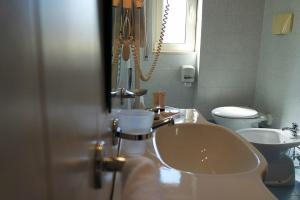 Kúpeľňa v ubytovaní Sait Hotel & BB