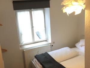 Ein Bett oder Betten in einem Zimmer der Unterkunft Ferienwohnung Gruß aus Partenkirchen
