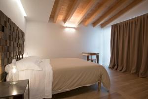 Cama ou camas em um quarto em OrtoPì Country Canapa House