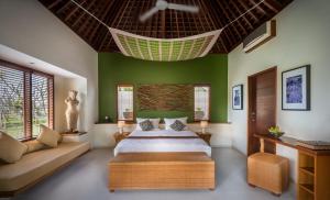 Ένα ή περισσότερα κρεβάτια σε δωμάτιο στο Villa Sabandari