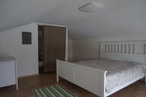 Postel nebo postele na pokoji v ubytování Pargi Apartment