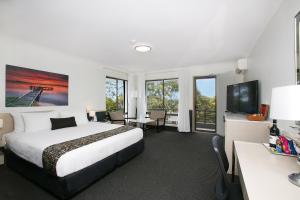 BEST WESTERN PLUS Apollo Hotel Newcastle客房内的一张或多张床位