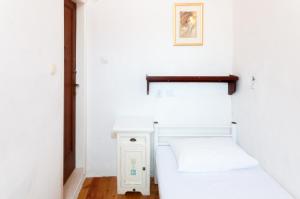 Posteľ alebo postele v izbe v ubytovaní Old Town Hostel