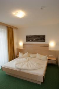 Postel nebo postele na pokoji v ubytování Haus Mühlbach