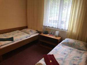 Postel nebo postele na pokoji v ubytování Chata Rosa