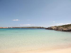 a view of a beach with the blue water at Case Pescatori in Lampedusa