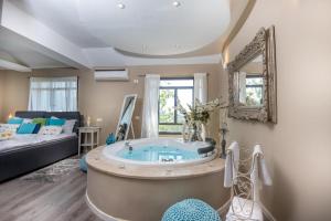 Letto o letti in una camera di Champagne suites