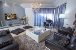 Area soggiorno di Champagne suites