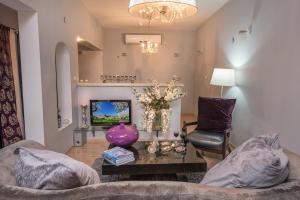 TV o dispositivi per l'intrattenimento presso Champagne suites