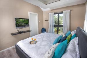 TV o dispositivi per l'intrattenimento presso Champagne suites