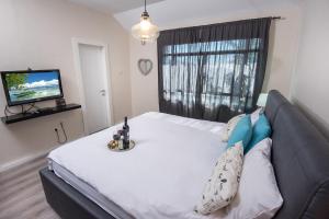 Letto o letti in una camera di Champagne suites