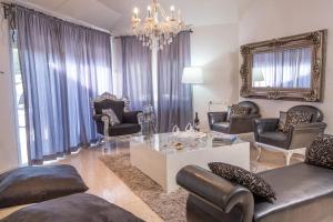 Area soggiorno di Champagne suites