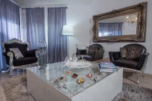 Area soggiorno di Champagne suites