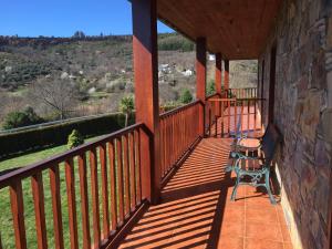 A balcony or terrace at Alojamiento en entorno rural Los Trobos