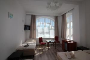 Postel nebo postele na pokoji v ubytování Villa Amadea