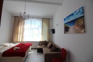 Postel nebo postele na pokoji v ubytování Villa Amadea